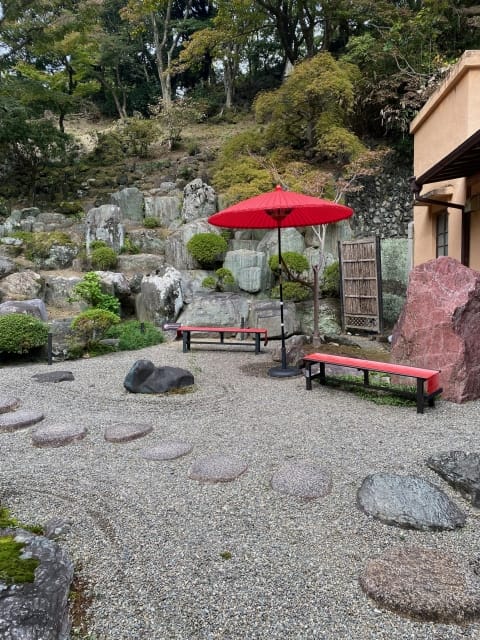 Red umbrella and Japanese style garden